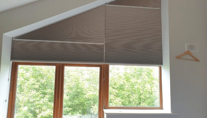 Roman shades in trapezoid window 